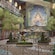Artist rendering of Disney Imagination Garden on the Disney Adventure with Sorcerer Mickey in a patio area and a Cinderella Castle backdrop